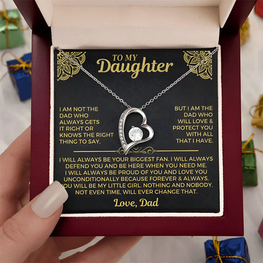 Silver hollow openwork heart pendant necklace presented in a gift box with a card.