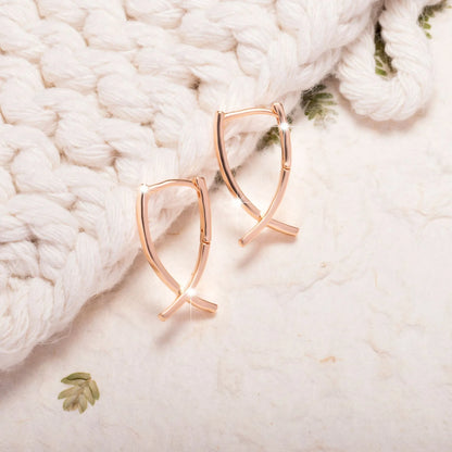 Cross-shaped copper earrings with rose gold finish, showing dimensions and post closure