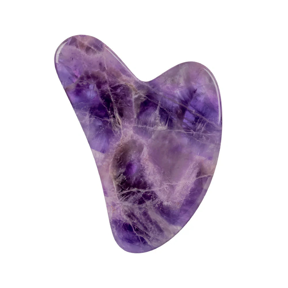 Amethyst facial roller set with heart-shaped gua sha and claw massage tools on white background