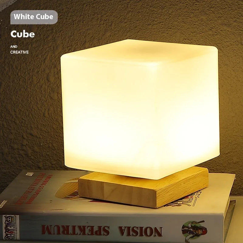 Nordic solid wood USB table lamp with touch dimming, 150x180mm size, and white light shapes on a bedside table