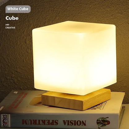 Nordic solid wood USB table lamp with touch dimming, 150x180mm size, and white light shapes on a bedside table