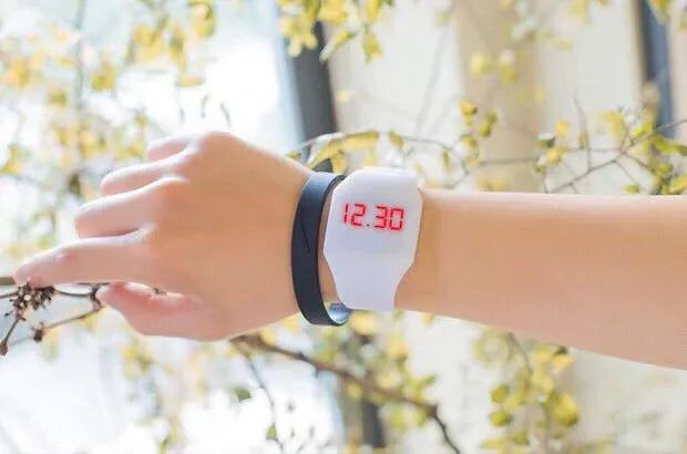 Square digital electronic watch with touch screen on a PU strap, shown in multiple colour options.