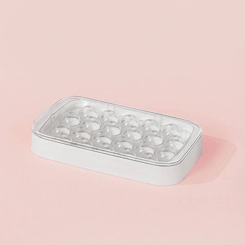 Silicone ball ice hockey mould producing spherical ice cubes, shown in Qingbo blue colour with modern minimalist design