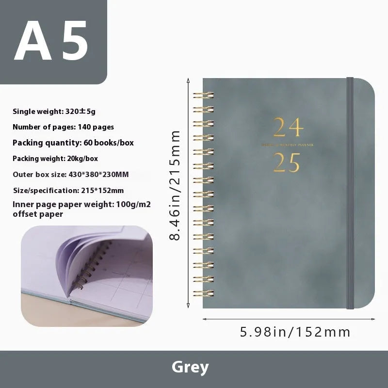 A5 size PU leather notebook with metal coil binding in a choice of colours including black, blue, and brown.