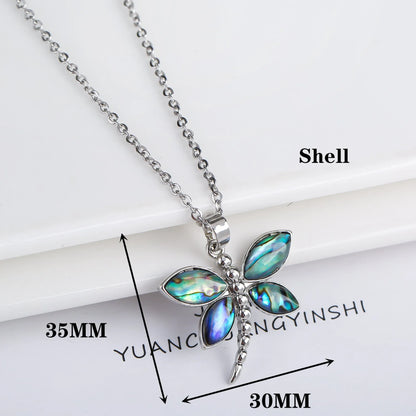 Abalone shell pendant necklace with copper electroplated animal zodiac design and butterfly or dragonfly detail