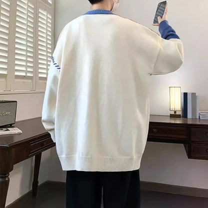 Men's colorblock pullover sweater in green, orange, and gray for winter fashion