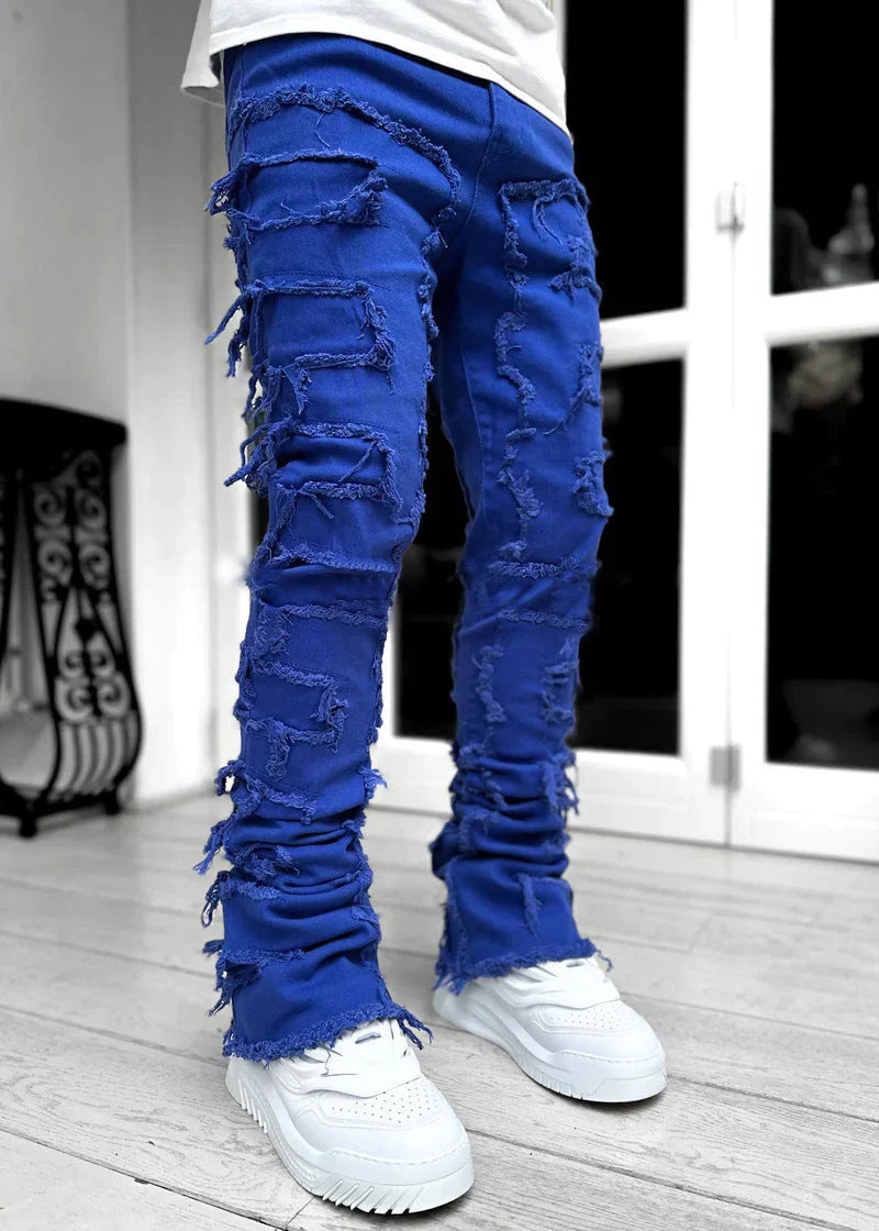 Stylish patched men's jeans with tight, stacked fit and variety of vibrant color options