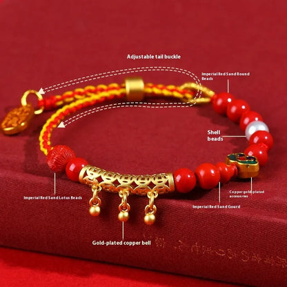 Women's red cinnabar hand-woven rope bracelet with geometric design and bell charm