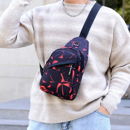 Men's sling chest bag in blue with earphone hole, crossbody strap, and zipper pockets, measuring 17cm wide.