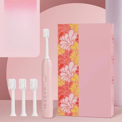 Yellow rechargeable electric toothbrush with small duck design, soft bristles and USB charging cable