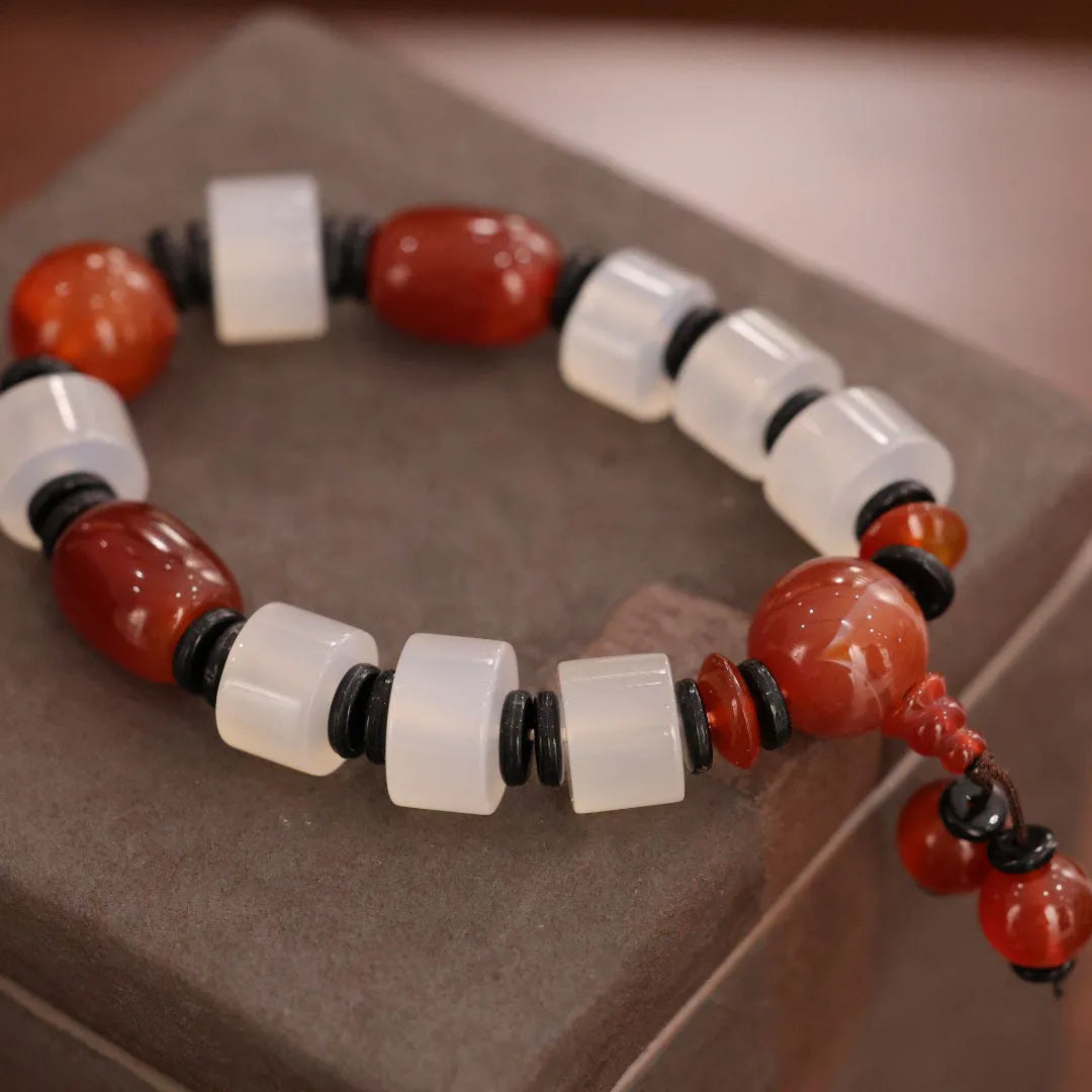 Natural agate ethnic bracelet with geometric design featuring multiple agate bead types and sizes