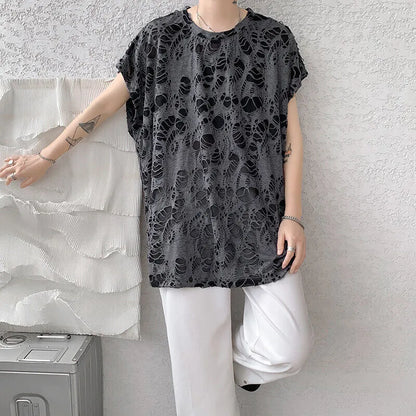 Black sleeveless vest with distressed hole detailing and wide shoulder loose fit