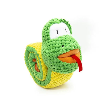 Squeak dog toy in snail or stick shape with hidden food holes for foraging training, measuring 7.5 cm by 7.2 cm