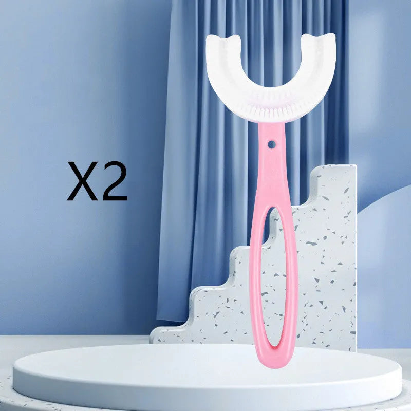 Children's U-shaped soft rubber toothbrush in pink and blue colours.