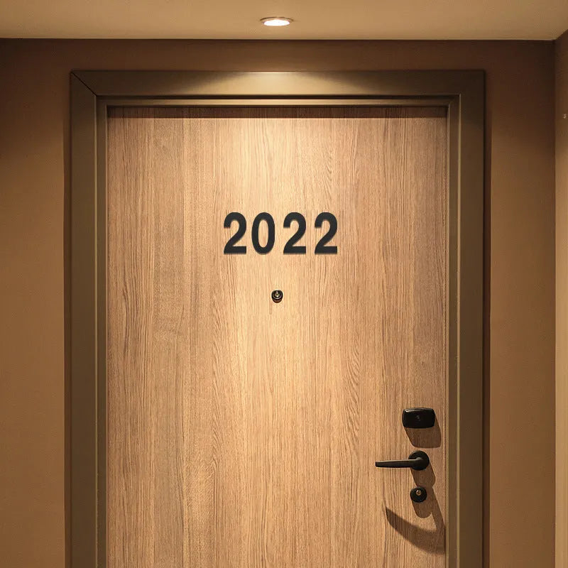 Black stainless steel sticky digital house number measuring 7.5cm with waterproof design and adhesive backing