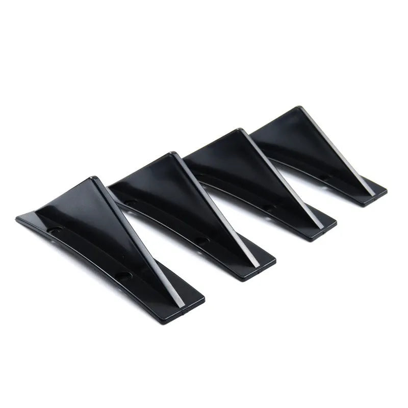 Black universal triangle rear car spoiler made from ABS plastic with a 15cm base.