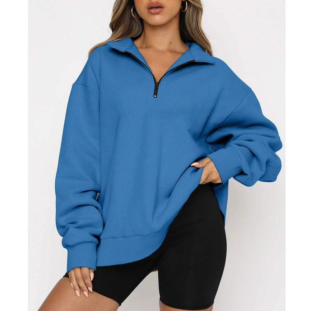 Women's zip turndown collar sweatshirt in various colors, showcasing loose fit and zipper detail.