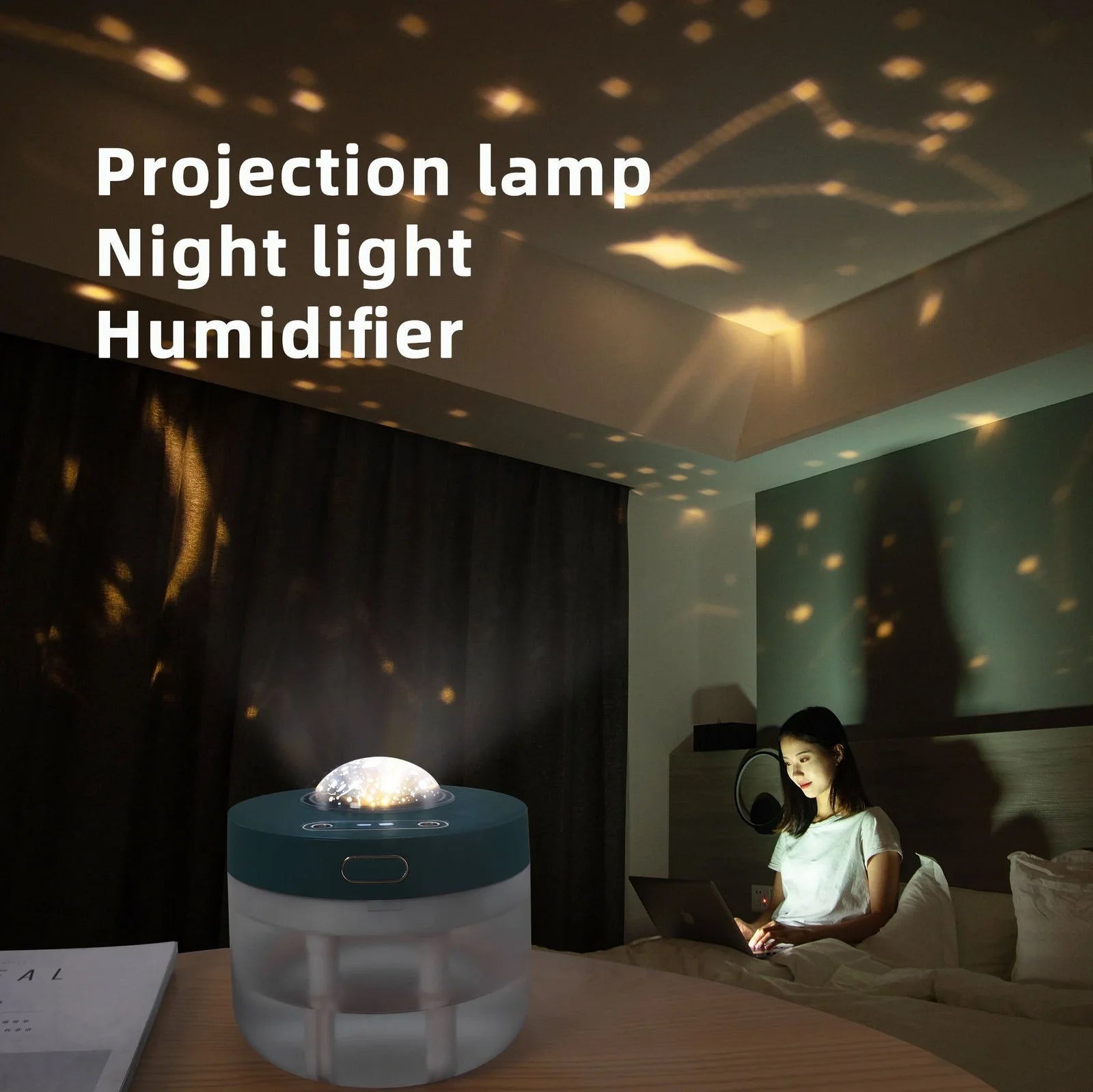 White portable humidifier with rotating projection light showing blue illumination and dual spray mist output