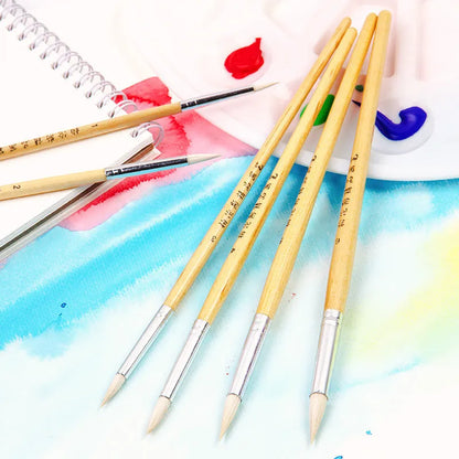 Six wooden pen brushes with pointed hook line design and wool bristles arranged together