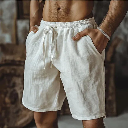 Men's cotton linen beach shorts in straight-leg British style shown in seven colour options