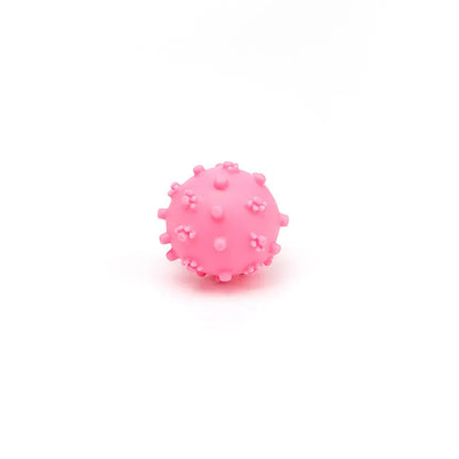 Four colourful spiky dog balls with paw print dimples, measuring 2 inches diameter for small breed dogs