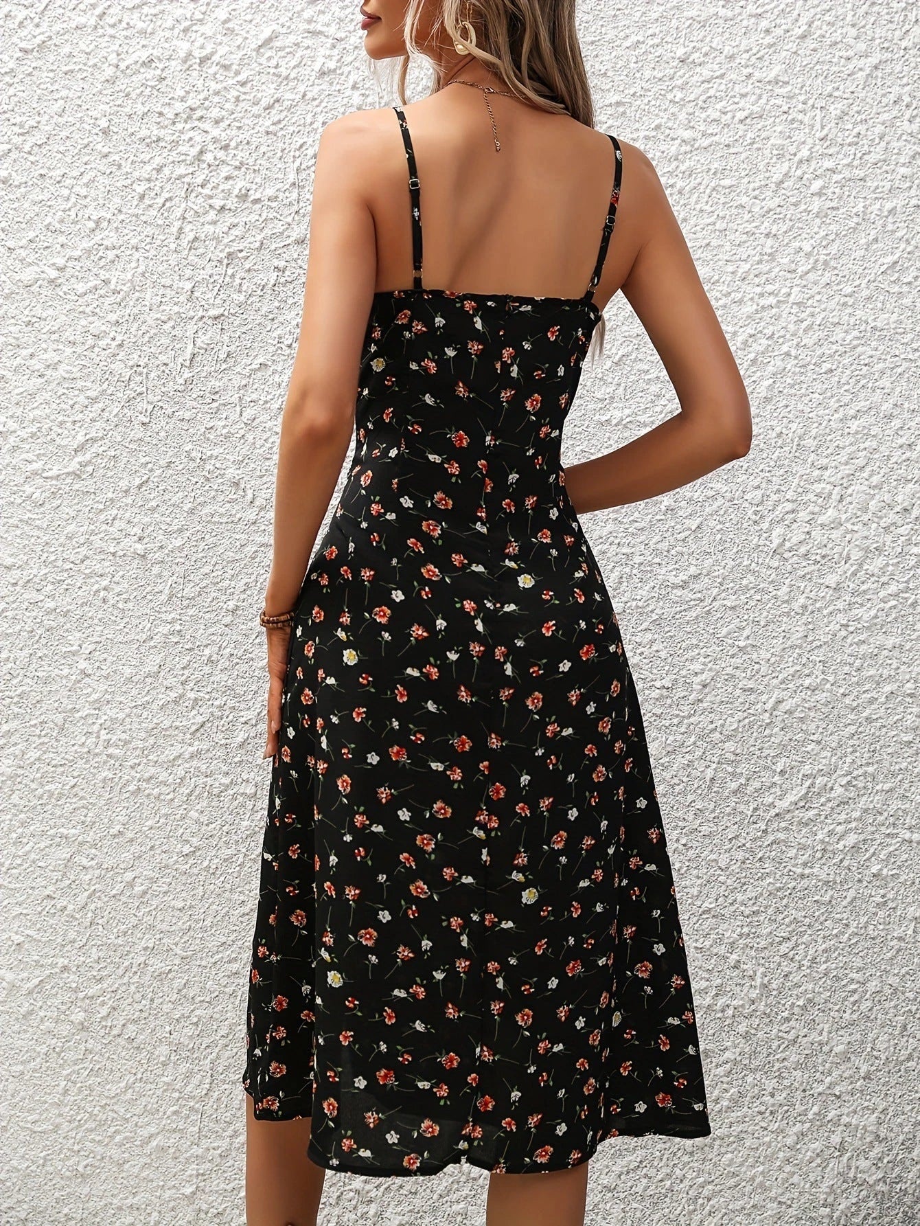 Stylish polka dot suspender dress with adjustable straps, side slit, and available in multiple vibrant colors