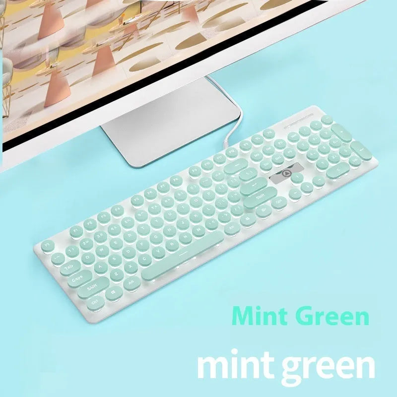 Punk mechanical feel keyboard with backlight in mint green, pink, or black blue light colours, measuring 44cm wide