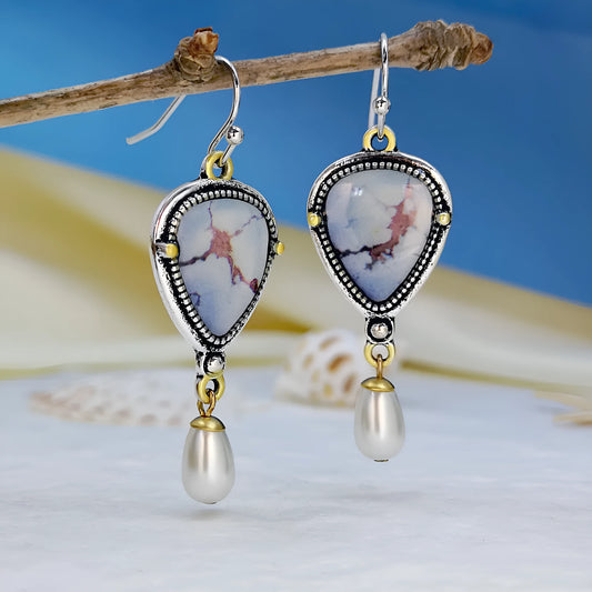Retro blue geometric drop earrings with synthetic opal and pearl detail on a metal base.