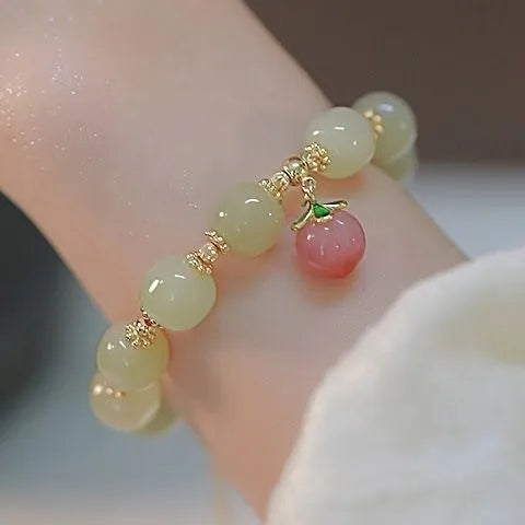 Unisex peace buckle bracelet with glass beads, coloured glaze components and rabbit motif in national style design