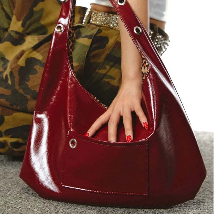 Women's shoulder bag with leopard print design, PU leather construction, casual retro dumpling-shaped crossbody bag with large capacity and red colourway, suitable for commuter use and everyday casual style.
