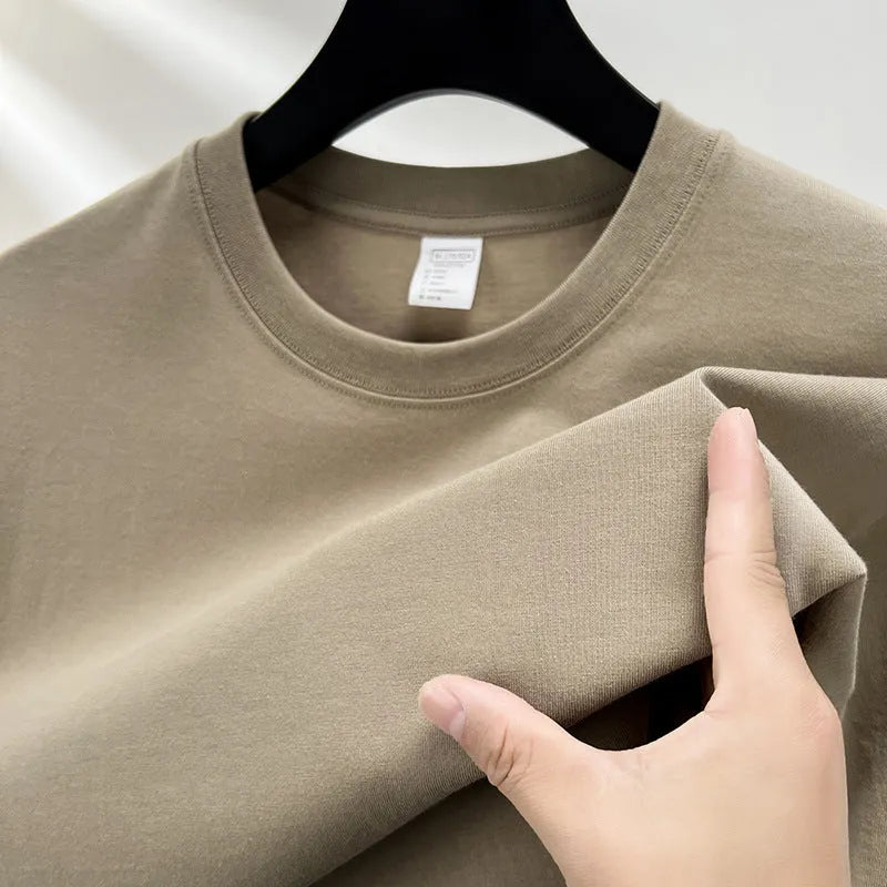 Men's drop shoulder t-shirt in thin cotton fabric, shown in a solid colour.