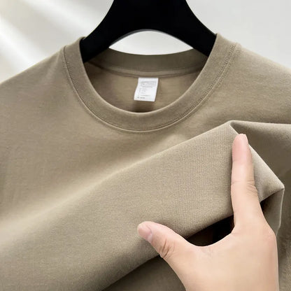 Men's drop shoulder t-shirt in thin cotton fabric, shown in a solid colour.