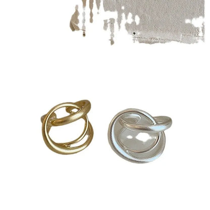Geometric open ring with interlaced pattern and matte finish, adjustable for finger sizes 16mm to 20mm