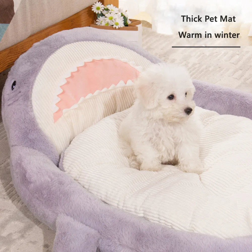 Blue shark pattern pet bed for dogs with soft velvet fabric and anti-slip base.