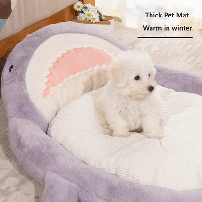 Blue shark pattern pet bed for dogs with soft velvet fabric and anti-slip base.