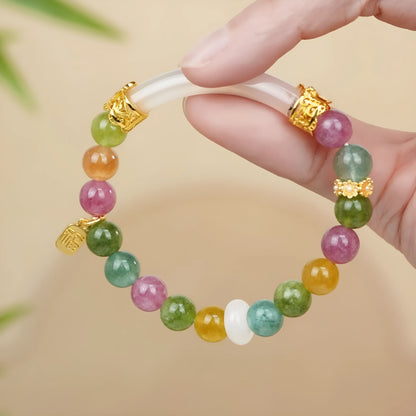 Tourmaline rainbow colour half bracelet with electroplated finish showing natural stone texture and partial wrist coverage design