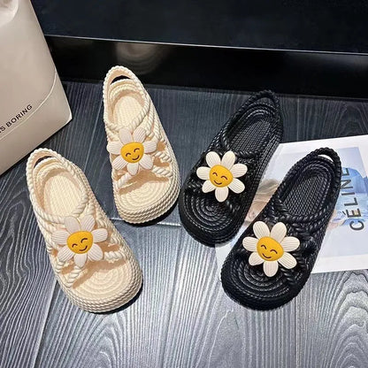 Women's beige PVC sandals with a sunflower pattern and round toe on a non-slip sole.