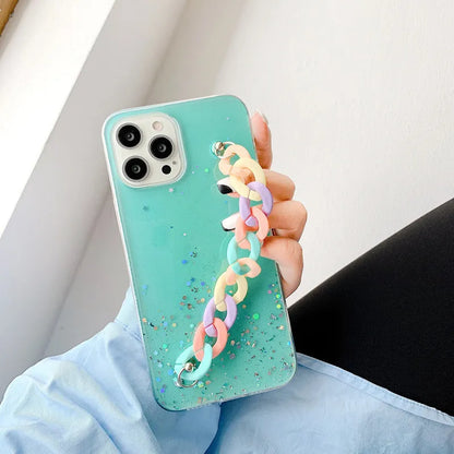 Silicone soft cover phone case with bracelet starry design in transparent, black, pink, or green for iPhone 14 and 15