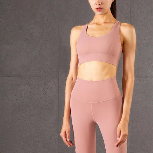 Gather Strength Yoga Bra with mesh panel and detachable chest pad in Black, Pink Pastel, Desert Teal, and Chambray