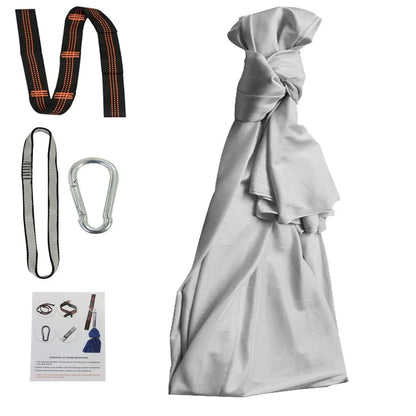 Child in black therapy swing cocoon with multi-loop daisy chain height adjustment system