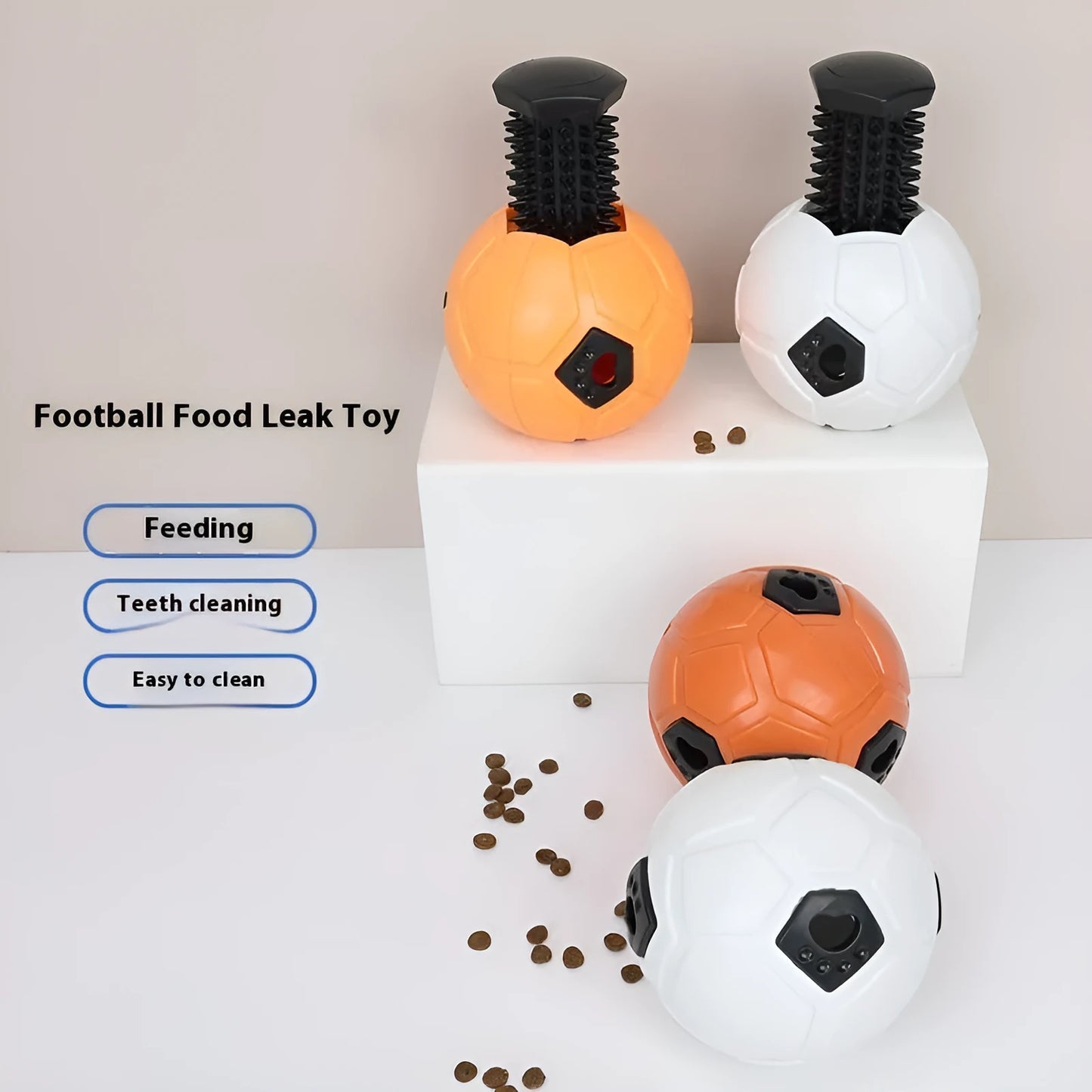 Orange and white TPR dog toy balls, one hollow and one with a teeth cleaning stick, for small dogs