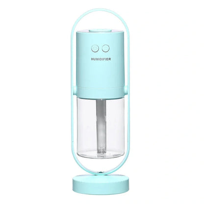 Portable USB humidifier with 200ml water tank in pink, blue, or white showing compact 70x66x213mm dimensions