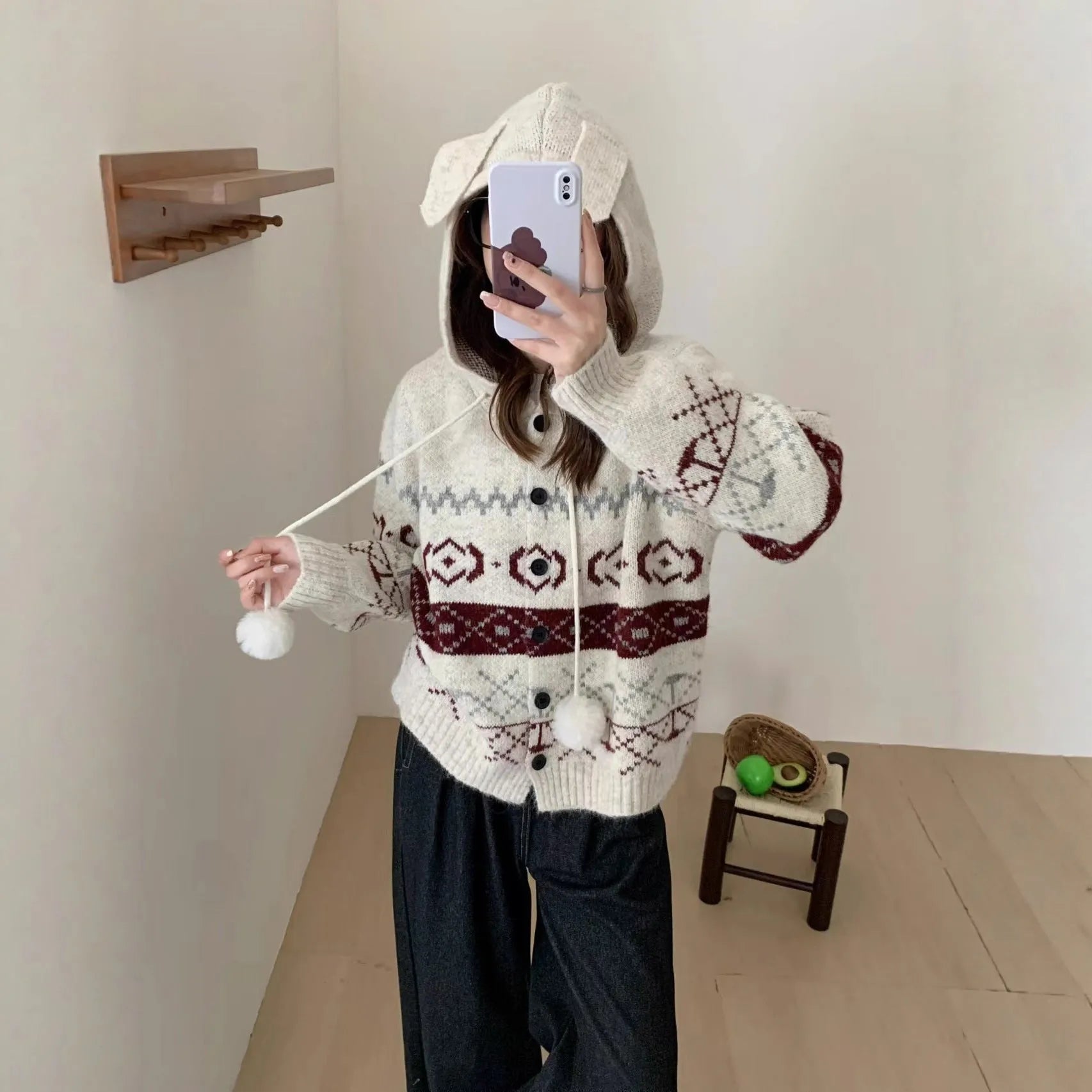 Women's loose-fit brocade sweater coat with geometric pattern in milky white colour, showing long sleeves and regular sleeve cut