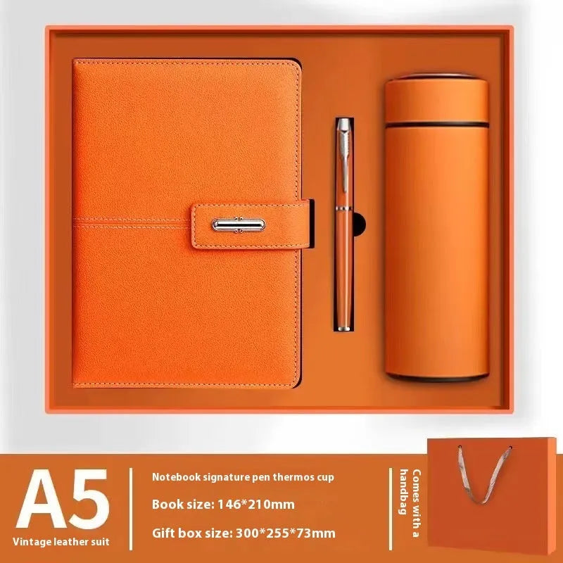 A5 notebook with imitation leather cover in a choice of colours including black, red, green, blue, and orange.