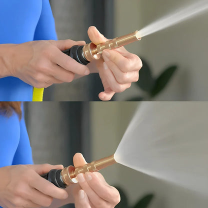 Stainless steel garden hose with brass adjustable nozzle coiled in UK garden setting