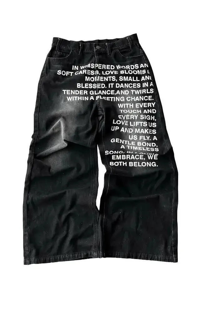 Men's black wide-leg cotton casual trousers showing loose straight cut