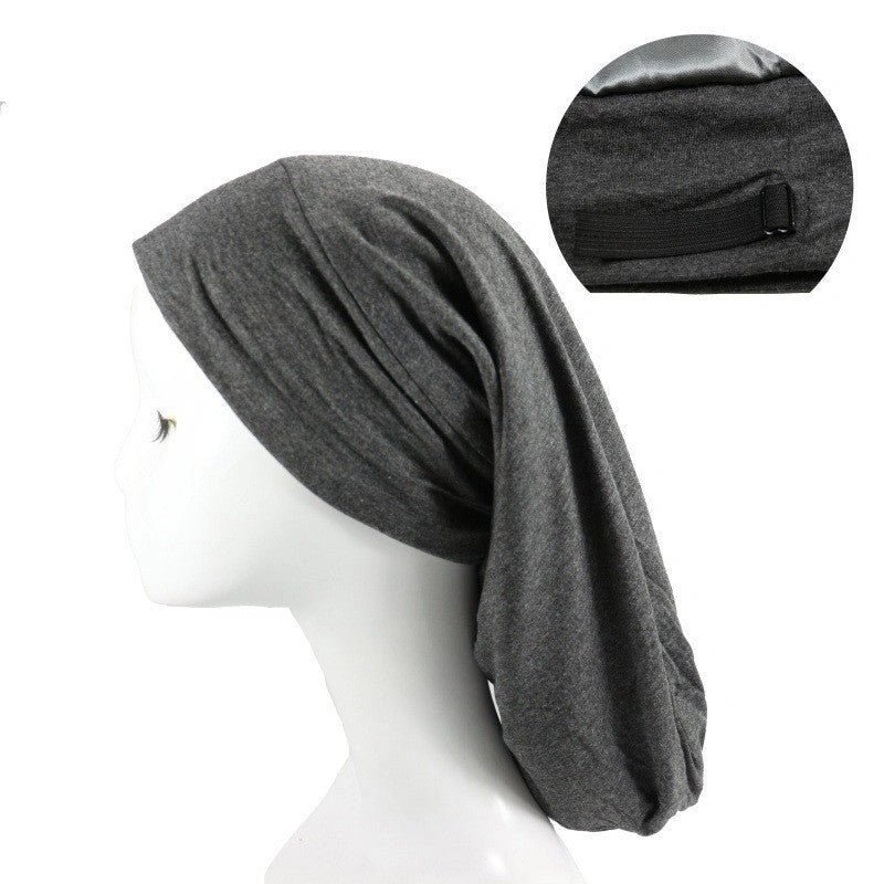Adjustable satin-lined nightcap in various colors for women's hair care and relaxation