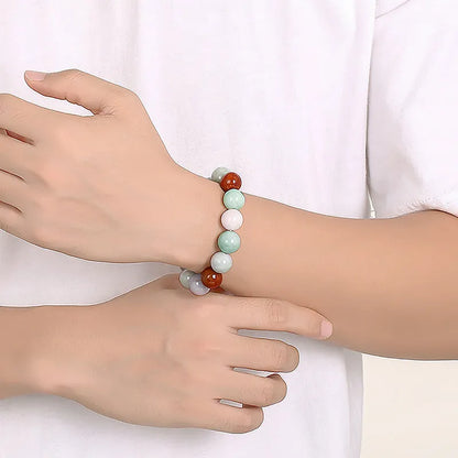 Women's natural jade bracelet with 13mm round beads showing three colours, national style design.