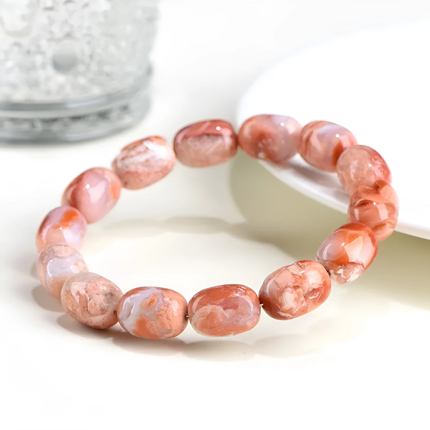 Natural cherry agate barrel bead bracelet with 10x14mm geometry design and Ruyi elements on wrist