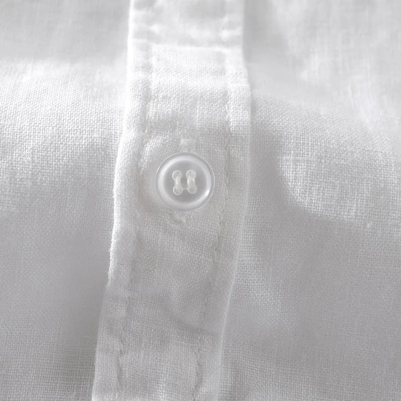 Men's light blue short sleeve linen blend casual shirt with a loose fit.